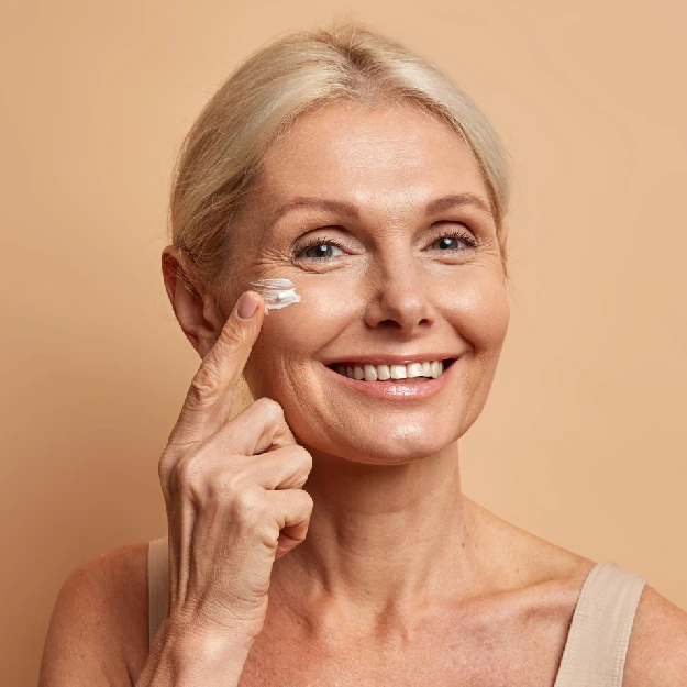 young men applying advanced moisturizing night cream to goodbye face fatigue and dryness
